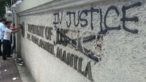 The Department of Justice's seal and sign were found defaced at the end of the Mindanao lumads' picket at DOJ on Nov. 5, 2015. Photo by Jerome Aning, Philippine Daily Inquirer