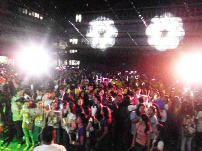 YOUTH and glow sticks light up the symbolic walk around USC campus prior to the formal launch of Hopeline.