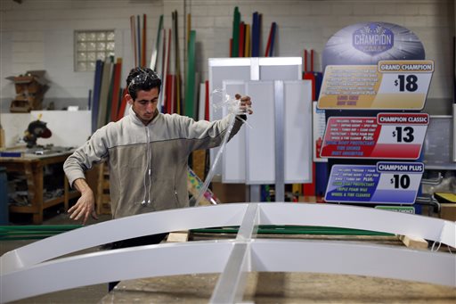 Syria refugee Nedal Al-Hayk works as a fabricator Monday, Nov. 16, 2015 in Warren, Mich. Several U.S. governors are threatening to halt efforts to allow Syrian refugees into their states in the aftermath of the coordinated attacks in Paris, though an immigration expert says they have no legal authority to do so. (AP Photo/Paul Sancya)