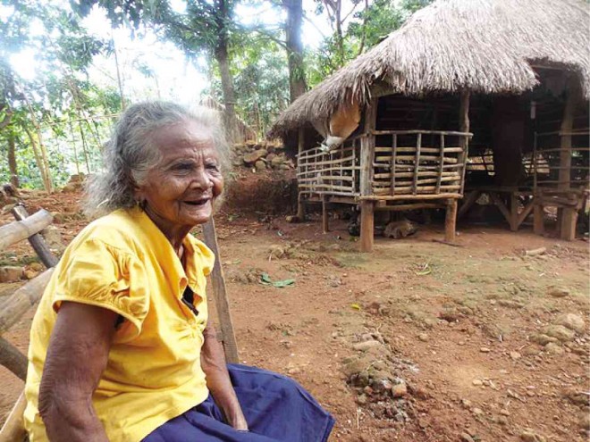 LORETA Dabe, a 70-year-old Aeta, says she will implore the souls of her departed relatives to give her good health and protect her from danger. ALLAN MACATUNO/INQUIRER CENTRAL LUZON