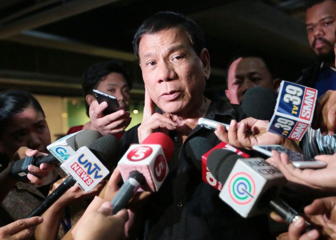 Rodrigo Duterte answers questions from reporters at Greenhills, San Juan. INQUIRER FILE PHOTO / GRIG C. MONTEGRANDE