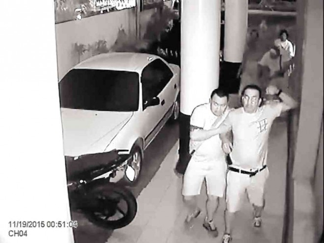 THE PHILIPPINE Drug Enforcement Agency has identified the two persons caught on security footage trying to break into the office of dyOK Aksyon Radyo Iloilo as alleged drug lord Melvin Odicta Sr. (right) and his son, Melvin Jr. VIDEO GRAB FROM AKSYON RADYO