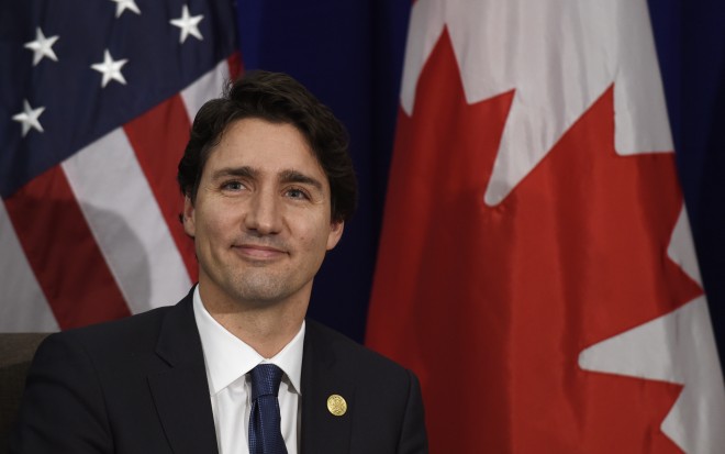 Canada’s Prime Minister Justin Trudeau listens to a reporters question during a bilateral meeting with U.S. President Barack Obama at the Asia-Pacific Economic Cooperation summit in Manila, Philippines, Thursday, Nov. 19, 2015. Trudeau says his country will remain a strong member of the campaign against the Islamic State group in Iraq and Syria. Trudeau and Obama are speaking to reporters after their first formal meeting since Trudeau took office earlier this month. Trudeau ran on a promise to pull Canada's fighter jets out of the U.S.-led air campaign against IS. (AP Photo/Susan Walsh)