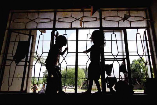STREET dwellers from Manila find ways to amuse themselves at the Boystown Complex in Parang, Marikina City, where they have been staying for more than a week following their “rescue” by social workers.  RICHARD A. REYES