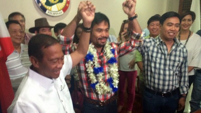 Manny Pacquiao at the Makati City Hall for a courtesy call with Mayor Jun Binay and VP Jejomar Binay.  INQUIRER FILE PHOTO