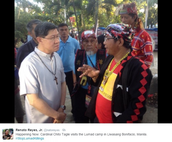Manila Archbishop Luis Antonio Cardinal Tagle converses with representatives of the lumad tribe camping out at the Liwasang Bonifacio. SCREENGRAB FROM RENATO REYES' TWITTER ACCOUNT