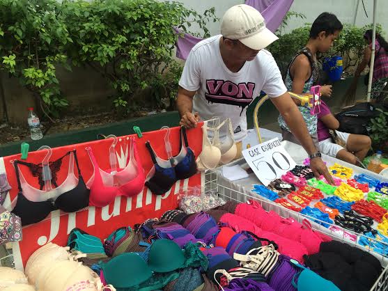 Bras are seen being sold just outside of the cemetery on All Saints' Day.    Photo by Jovic Yee, Philippine Daily Inquirer