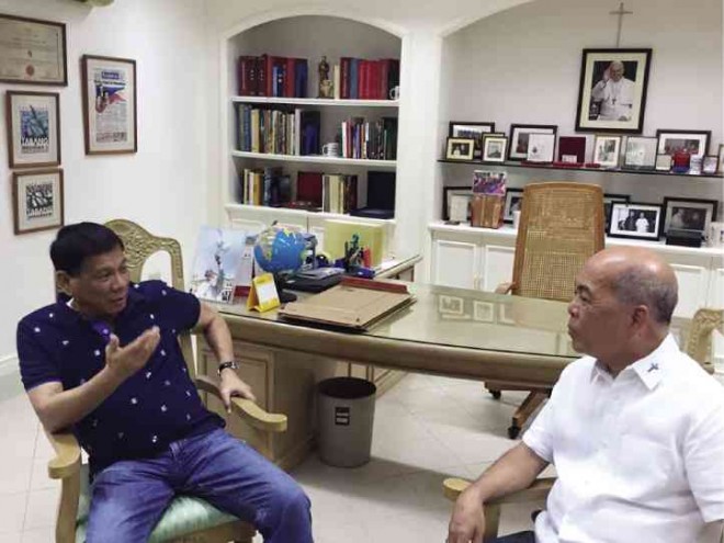 TRUE CONFESSIONS Presidential candidate and Davao City Mayor Rodrigo Duterte meets with Davao Archbishop Romulo Valles on Thursday following his public disclosure about being sexually abused by a Catholic priest in school.  FROM CHRISTOPHER BONG CO’S FACEBOOK