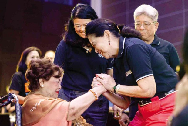 INQUIRER IN GOOD HANDS Inquirer chair Marixi Rufino-Prieto (right) greets Inquirer founding chair Eugenia “Eggie” Apostol during the 30th anniversary bash of the paper on Wednesday, while Inquirer President and CEO Sandy Prieto-Romualdez and Inquirer board member Charlie Rufino look on. ELOISA LOPEZ