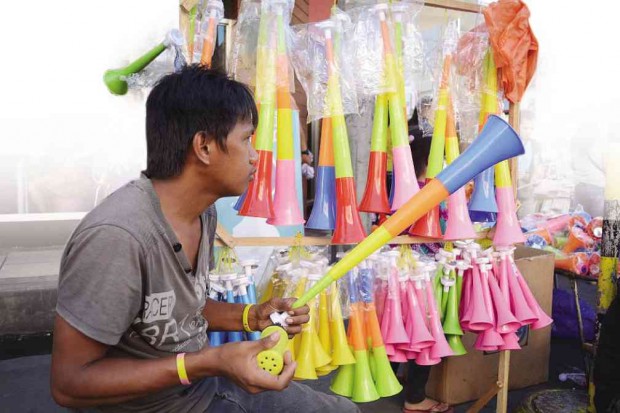 HORNS, this time made of plastic and imported from China, are enjoying brisk sale in Davao City, which bans all forms of firecrackers and fireworks and has been celebrating the holidays without gunpowder-based noisemakers. GERMELINA LACORTE/INQUIRER MINDANAO