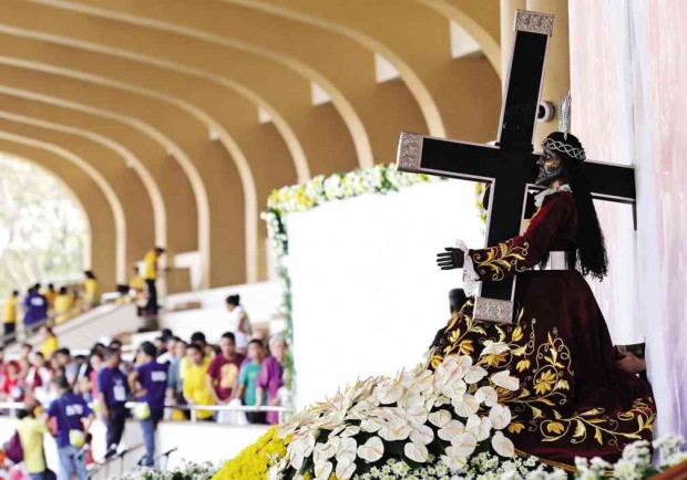 JOURNEY OF FAITH  After spending Friday at Quirino Grandstand for the traditional “Pahalik,” the iconic Black Nazarene once again goes on the road today  for the mammoth procession back to Quiapo Church.   RAFFY LERMA