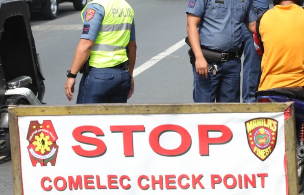 A Comelec checkpoint. STORY: Comelec to begin accepting gun ban exemption applications on June 5