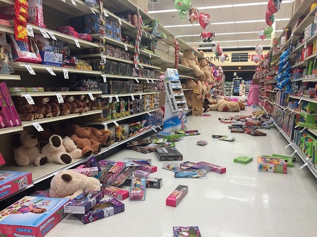 In this photo provided by Vincent Nusunginya, items fallen from the shelves litter the aisles inside a Safeway grocery store following a magnitude 6.8 earthquake on the Kenai Peninsula on Sunday Jan. 24, 2016, in south-central Alaska. The quake knocked items off shelves and walls in south-central Alaska and jolted the nerves of residents in this earthquake prone region, but there were no immediate reports of injuries. (Vincent Nusunginya via the AP)