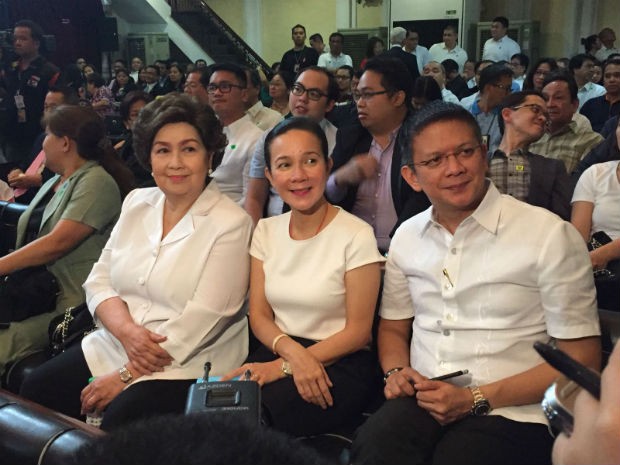 Presidential aspirant Senator Grace Poe is flanked by her mother actress Susan Roces and running mate Senator Francis "Chiz" Escudero as they await the start of the oral arguments on the disqualification cases filed against her. TETCH TORRES-TUPAS/INQUIRER.net