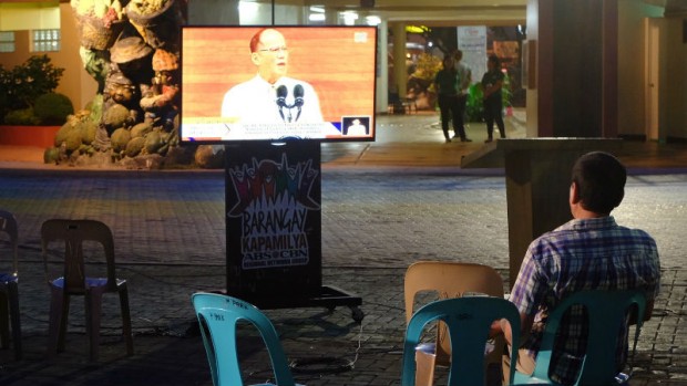 Davao City Mayor Rodrigo Duterte watches President Aquino's SONA during the public viewing at the People's Park Photo courtesy of the City Information Office
