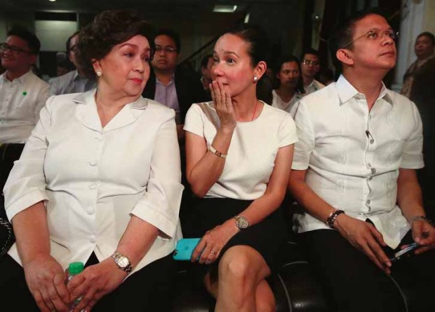 STARWATTAGE Movie actress Susan Roces (left), Sen. Grace Poe’s adoptivemother, lends glamour to the proceedings at the Supreme Court on Tuesday, during the oral arguments on Poe’s petitions against the Comelec’s cancellation of her certificate of candidacy for President.With them is Poe’s running mate, Sen. Chiz Escudero. MARIANNE BERMUDEZ