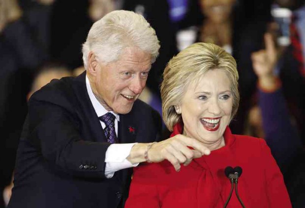 Former US President Bill Clinton and Democratic presidential candidate Hillary Clinton  AP FILE PHOTO