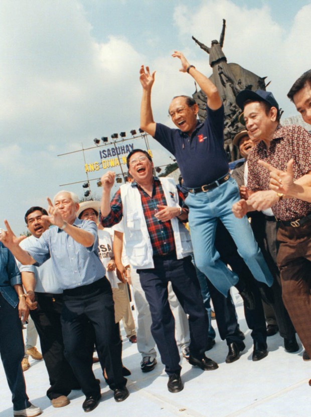 February 25, 2000 Fidel Ramos reenacts his now famous "Jump" at the 14th EDSA anniversary. DENNIS SABANGAN