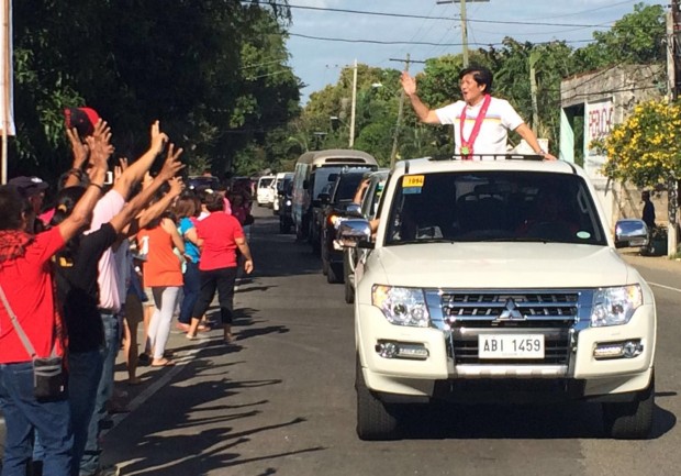 Vice presidential bet Senator Bongbong Marcos holds a motorcade in his home province of Ilocos Norte during the start of the campaign period for national elections. NINO JESUS ORBETA/PHILIPPINE DAILY INQUIRER