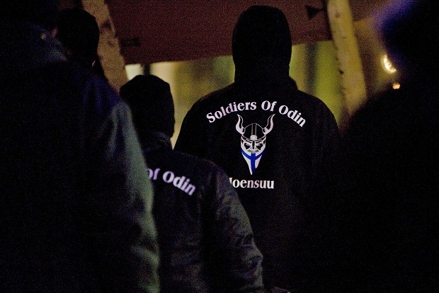 In this photo taken on Friday, Jan. 8, 2016, a group that calls themselves the Soldiers of Odin demonstrate in Joensuu, Eastern Finland. The rise of the Soldiers of Odin, which claims 500 members, has sparked both concern and ridicule in the Nordic country. They derive their name from a Norse god, and insist their patrols are needed to protect the peace in the sparsely populated nation of 5.5 million, which wasn’t a major destination for migrants until 32,500 people applied for asylum last year. (Minna Raitavuo/Lehtikuva via AP)  FINLAND OUT
