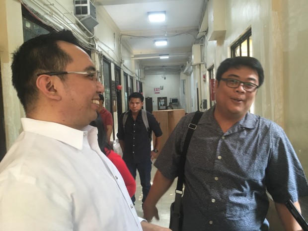 Lawyer Kristoffer Purisima (left) and his client Davis Flores (right) file an adultery complaint against ex-INC pastor Lowell Menorca at the Manila City Prosecutor's office.