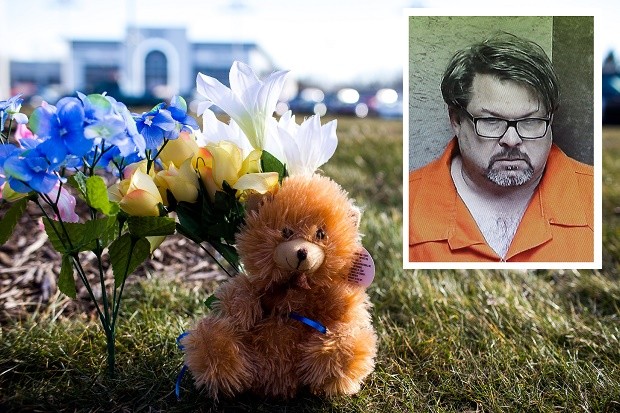 A makeshift memorial is seen near where people were shot near car dealership Sunday, Feb. 21, 2016, in Kalamazoo, Mich. According to police a man drove around Kalamazoo fatally shooting several people at multiple locations on Saturday. Authorities identified the shooter as Jason Dalton. (Andraya Croft/Detroit Free Press via AP)  DETROIT NEWS OUT; TV OUT; MAGS OUT; NO SALES; MANDATORY CREDIT DETROIT FREE PRESS