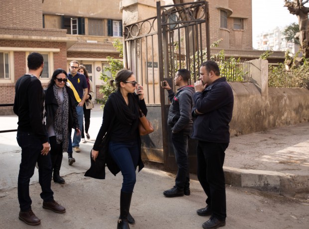 Mourners leave the Italian Hospital in Cairo after a a private mass at the church in the hospital complex for slain Italian graduate student Giulio Regeni on Friday, Feb. 5, 2016. AP
