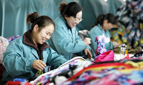 Female workers manufacture garment that will be exported to the European Union in Huaibei city, Anhui province FILE PHOTO COURTESY OF CHINA DAILY/ASIA NEWS NETWORK