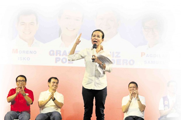 Sen. Grace Poe, who is running for President, and running mate Sen. Francis “Chiz” Escudero (right, seated) take center stage during the launch of their campaign in Iloilo City, considered turf of the Liberal Party and top LP leader Senate President Franklin Drilon. ARNOLD ALMACEN