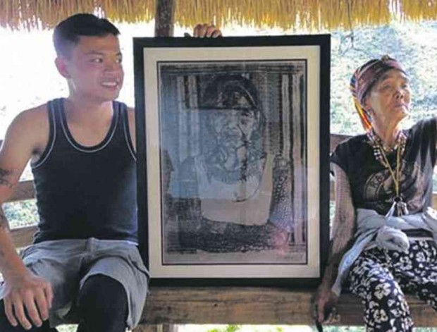 VINCENT Navarro sits beside Kalinga tattoo artist Whang-od.           CONTRIBUTED PHOTO