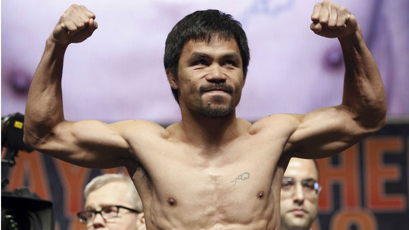 IN FULL RETREAT Manny Pacquiao finds himself against the ropes after comparing gays and lesbians to animals. AP