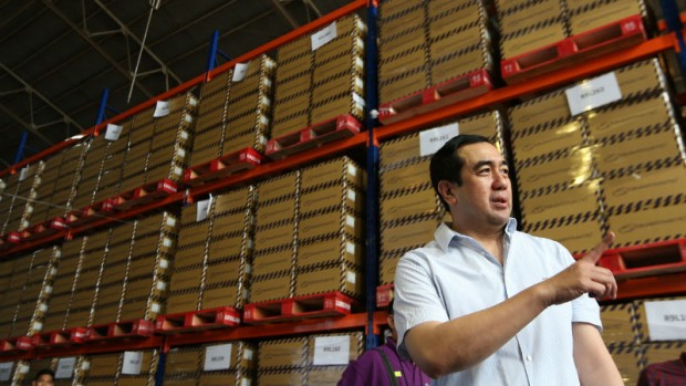 Comelec chair Andres Bautista during walkthrough at Commission on Elections warehouse in Sta. Rosa, Laguna province, February 4, 2016, which stores vote counting machines. INQUIRER PHOTO / NINO JESUS ORBETA