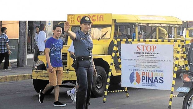 MOTORISTS in Olongapo City were greeted by the rare sight of an all-woman police team manning checkpoints as the official campaign period for national elections started on Feb. 9. The presence of policewomen at checkpoints, according to a member of the team, could “tone down the uptight mood.” ALLAN MACATUNO/INQUIRER CENTRAL LUZON