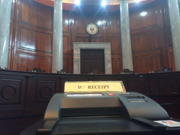 COMELEC vote counting machines at the Session Hall of the Supreme Court before the start of the oral arguments on the issuance of receipts. - raffy lerma
