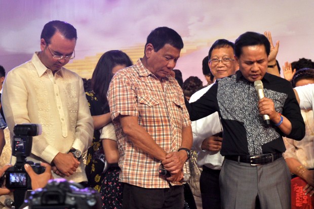 DUTERTE IN PANGASINAN / MARCH 28, 2016 Presidential candidate Mayor Rodrigo Duterte receives a pray over from Evangelist Apollo Quiboloy of Kingdom of Jesus Christ during a thanksgiving and worship prayer held in Lingayen town in Pangasinan province. PHOTO BY WILLIE LOMIBAO / INQUIRER NORTHERN LUZON