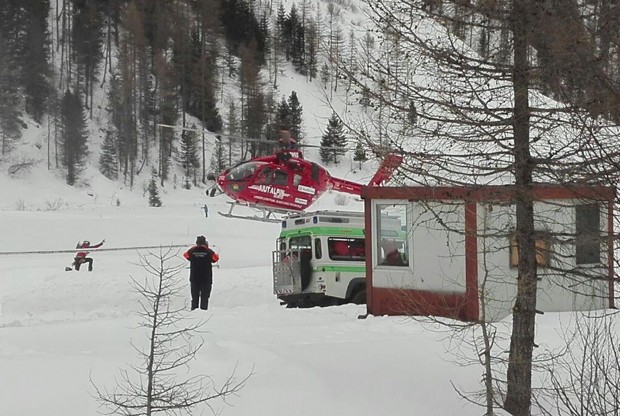 A rescue helicopter takes off  in Valle Aurina, in the Italian Alps, in order to reach the spot in Monte Nevoso where six backcountry skiers have died in an avalanche Saturday, March 12, 2016. The dead were in a group of backcountry excursionists who climb above tree line to the mountain crest and then ski down. (ANSA via AP Photo) ITALY OUT