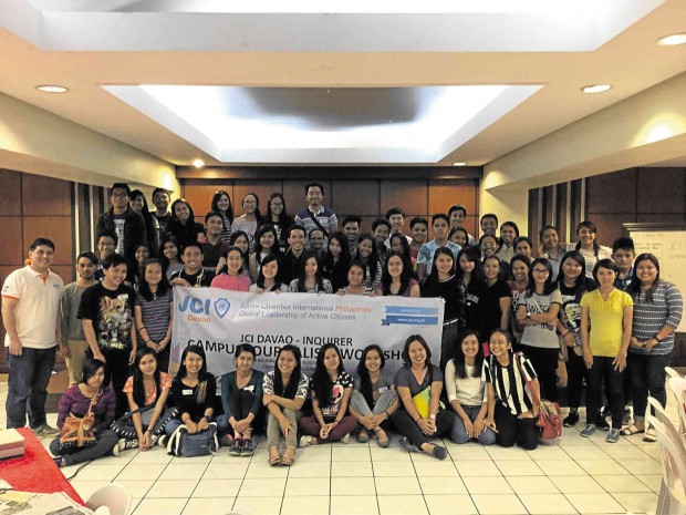 WORKSHOP coordinator Shandy Michael Sy (standing, left, in white shirt) joins participants in the third JCI-Inquirer campus journalism workshop in Davao in a class picture.