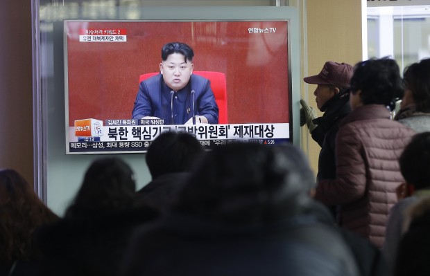 People watch a TV news program showing North Korean leader Kim Jong Un, at Seoul Railway Station in Seoul, South Korea, Thursday, March 3, 2016. North Korea fired several short-range projectiles into the sea off its east coast Thursday, Seoul officials said, just hours after the U.N. Security Council approved the toughest sanctions on Pyongyang in two decades for its recent nuclear test and long-range rocket launch. The screen reads "Sanction on the North Korea."  AP FILE PHOTO