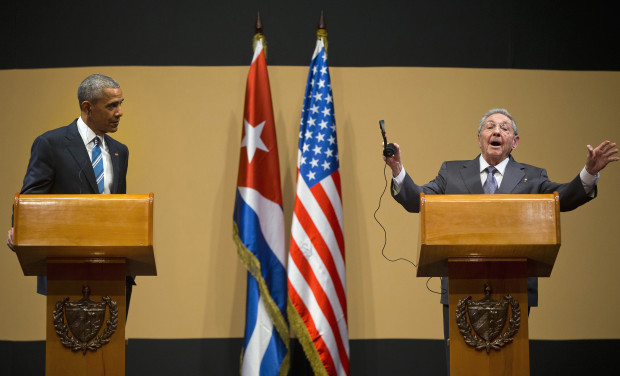 Cuban President Raul Castro gestures as he calls to an end his joint news conference with President Barack Obama at the Palace of the Revolution in Havana, Cuba, Monday, March 21, 2016. Obama's visit to Cuba is a crowning moment in his and Castro's bid to normalize ties between two countries that sit just 90 miles apart.  (AP Photo/Pablo Martinez Monsivais)