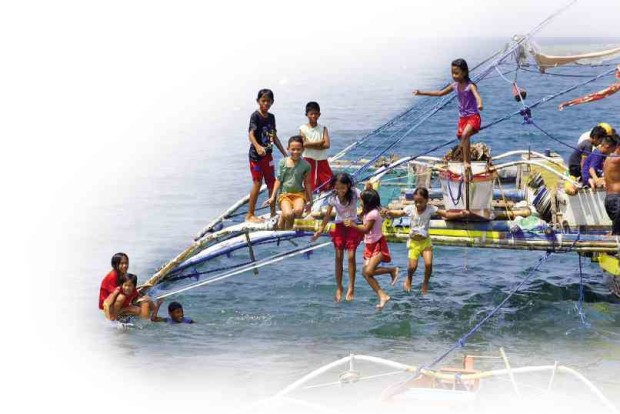 CHILDREN play on a fishing boat in the coastal village of Cato in Infanta town, Pangasinan province unaware of the stories that their fishermen fathers bring with them about their tense encounters with Chinese coast guard vessels in the Scarborough Shoal, also known as Panatag. WILLIE LOMIBAO/INQUIRER NORTHERN LUZON