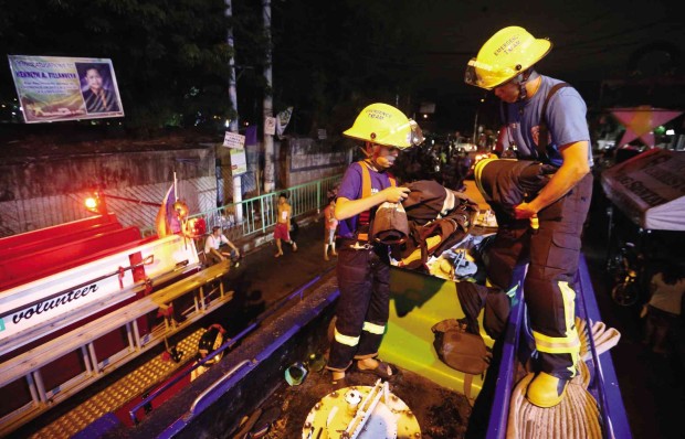 When a fire breaks out and the PAVG responds, Banny Cruz, shown with the group’s OIC  Arnold de Lima, can usually be found on his perch: On top of the group’s fire truck, guarding the firemen’s valuables. LYN RILLON
