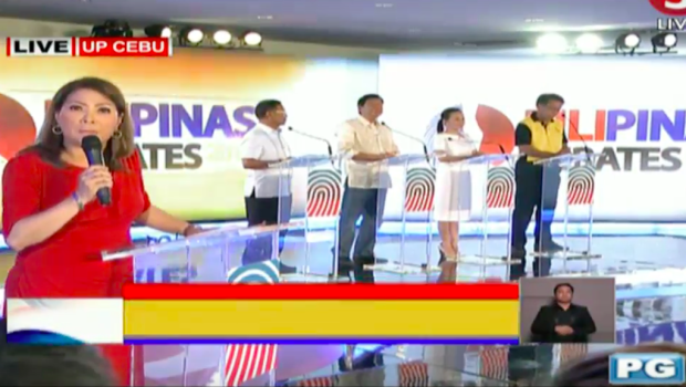 TV5 executive Luchi Cruz-Valdes moderates the second presidential debate. SCREENGRAB FROM TV5