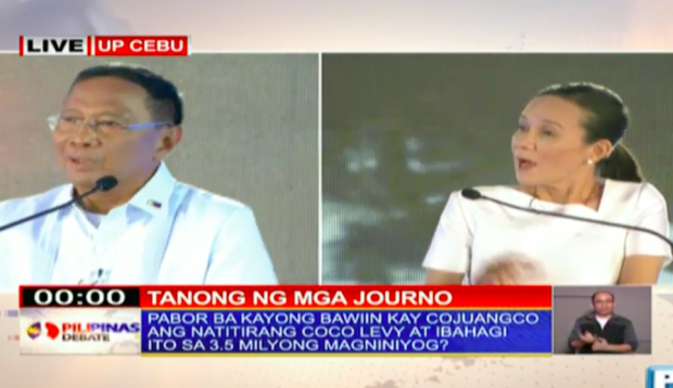 Vice President Jejomar Binay and Senator Grace Poe tackle the coco levy funds during the second presidential debate in UP Cebu. SCREENGRAB FROM TV5