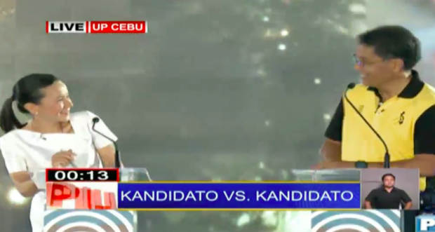 Senator Grace Poe and Mar Roxas face off during the second presidential debate in UP Cebu. SCREENGRAB FROM TV 5