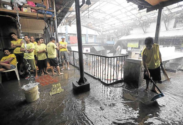 THE QUEZON City jail coping not just with overcrowding but also with leaky roofs            LYN RILLON