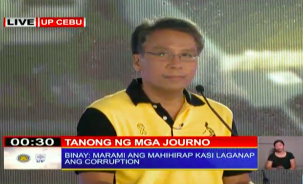 Interior Secretary Mar Roxas answers questions on corruption during the second presidential debate in UP Cebu. SCREENGRAB FROM TV5