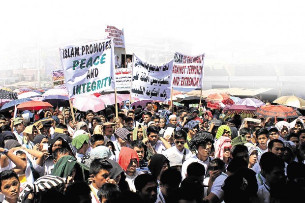 ULAMA in the Lanao provinces led some 5,000 Muslims in an indignation rally at Plaza Cabili in Banggolo, Marawi City, on March 10 to condemn the assassination attempt on respected cleric and author Dr. Aaidh ibn Abdullah al-Qarni and diplomat Sheik Turki Assaegh on March 2 in Zamboanga City. RICHEL V. UMEL/INQUIRER MINDANAO-