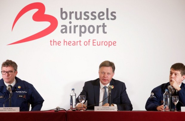 (LtoR) Federal Police spokesman Peter De Waele, Brussels Airport CEO Arnaud Feist and Federal Police spokesman Michael Jonniaux give a press conference regarding the reopening of Brussels Airport on April 2, 2016 in Zaventem. Brussels Airport is to reopen Sunday, 12 days after its departure hall was wrecked by Islamic State suicide bombings, with chief executive Arnaud Feist announcing three flights. A total of 32 people were killed in the March 22 attacks on the airport and a metro station in Brussels. / AFP / BELGA / NICOLAS MAETERLINCK / Belgium OUT