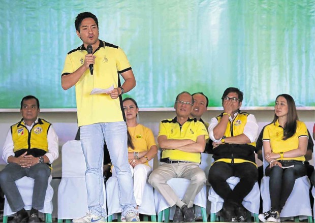 FAMILY AFFAIR Paolo Roxas, the son of Liberal Party standard-bearer Mar Roxas, makes his debut on the campaign trail in Sta. Rosa, Laguna province. President Aquino joins him onstage. JOAN BONDOC