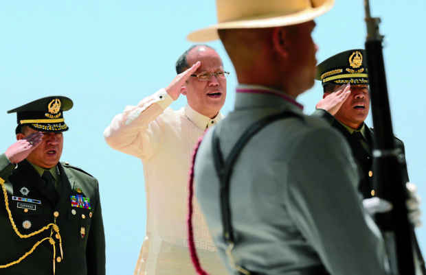 74TH DAY OF VALOR / APRIL 9, 2016 President Benigno Aquino III salutes and sings the National Anthem during the 74th commemoration of Araw ng Kagitingan at the Dambana ng Kagitingan, Mount Samat National Shrine, Pilar, Bataan on Saturday, April 9, 2016. INQUIRER PHOTO / GRIG C. MONTEGRANDE